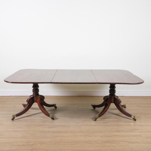 A GEORGE III AND LATER MAHOGANY D-END EXTENDING DINING TABLE