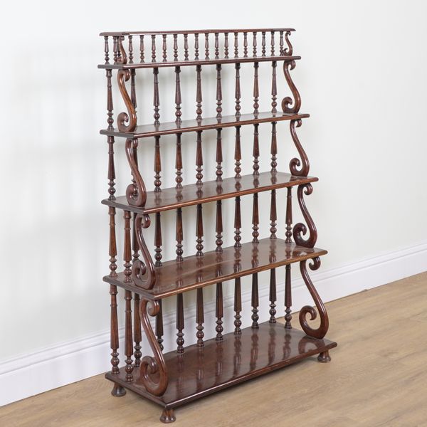 A REGENCY MAHOGANY WATERFALL FIVE TIER OPEN BOOKCASE