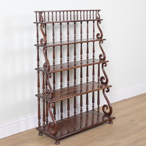A REGENCY MAHOGANY WATERFALL FIVE TIER OPEN BOOKCASE