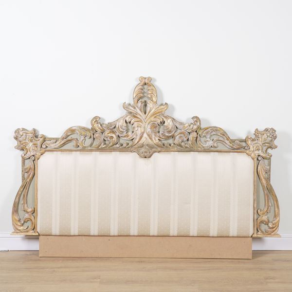 A VENETIAN STYLE GILT FRAMED ACANTHUS SCROLL HEADBOARD