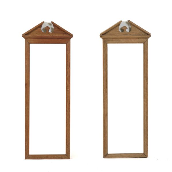 A PAIR OF PITCH PINE SLENDER FRAMED WALL MIRRORS (2)