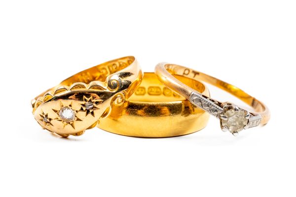 THREE GOLD RINGS (3)