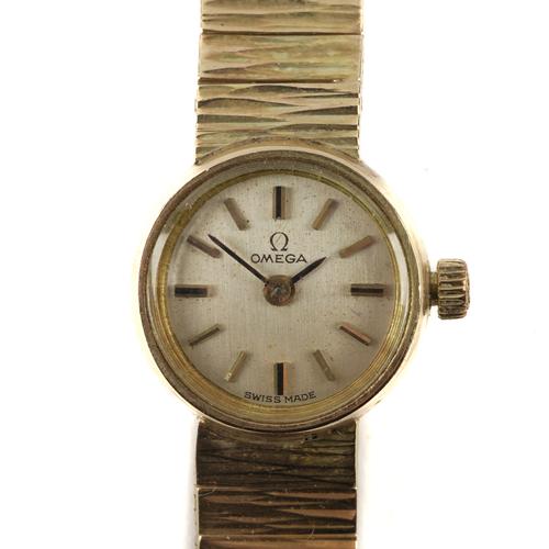 AN OMEGA 9CT GOLD LADY'S WRISTWATCH AND ANOTHER 9CT GOLD CASED LADY'S WRISTWATCH (2)