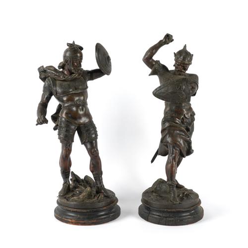 AFTER PIERRE-LOUIS DETRIER (FRENCH 1822-1897): A PAIR OF PATINATED SPELTER VIKING WARRIORS (2)