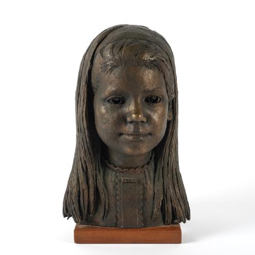 A BRONZE PORTRAIT BUST OF A YOUNG GIRL