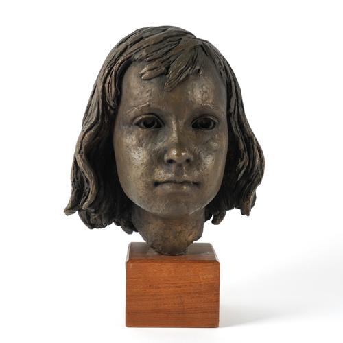 A BRONZE PORTRAIT BUST OF A YOUNG GIRL