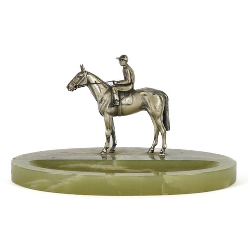 A SILVERED BRONZE JOCKEY MOUNTED ONYX PEN TRAY