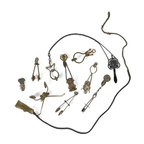 A COLLECTION OF VICTORIAN SKIRT LIFTERS (10)