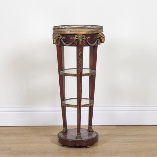 A FRENCH EMPIRE STYLE MAHOGANY GILT METAL MOUNTED THREE TIER JARDINIERE STAND