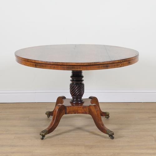 A REGENCY ROSEWOOD CIRCULAR SNAP TOP CENTRE TABLE