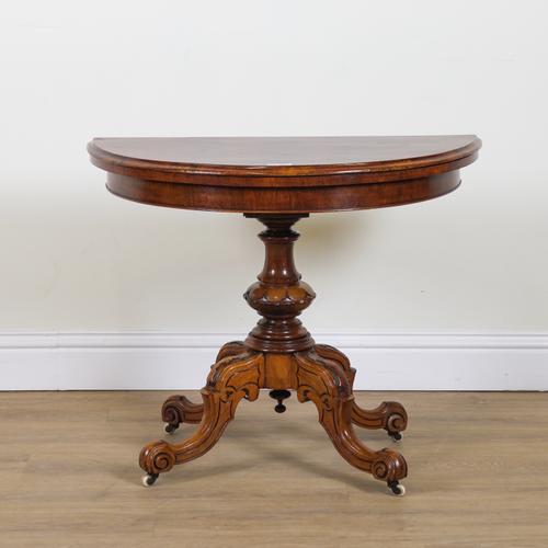 A VICTORIAN WALNUT DEMI LUNE FOLDOVER CARD TABLE