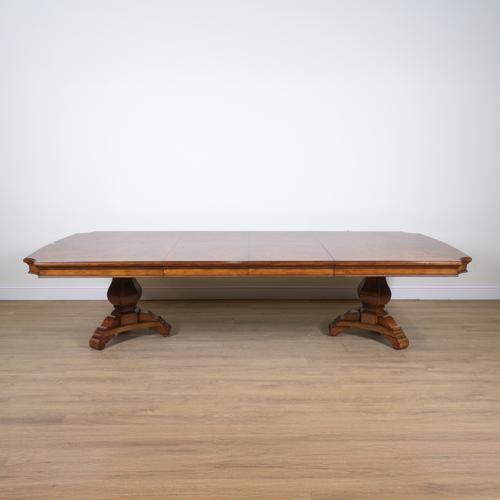 THOMASVILLE; AN EXTENDING TWIN PILLAR DINING TABLE