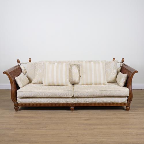 MULTIYORK; A STAINED BEECH CANED DROP END KNOLE SOFA