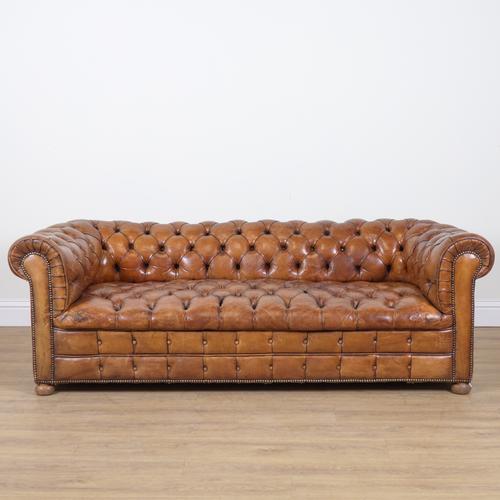 A TAN LEATHER BUTTONBACK UPHOLSTERED CHESTERFIELD SOFA