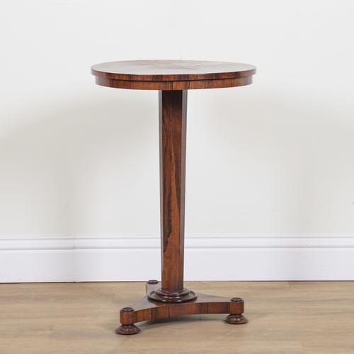 A REGENCY ROSEWOOD CIRCULAR OCCASIONAL TABLE