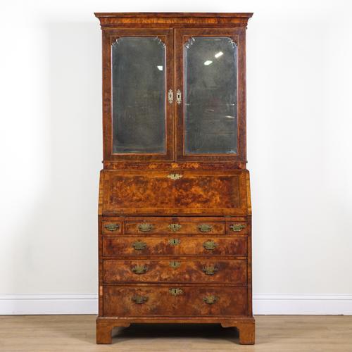 A GEORGE II BURR WALNUT BUREAU BOOKCASE