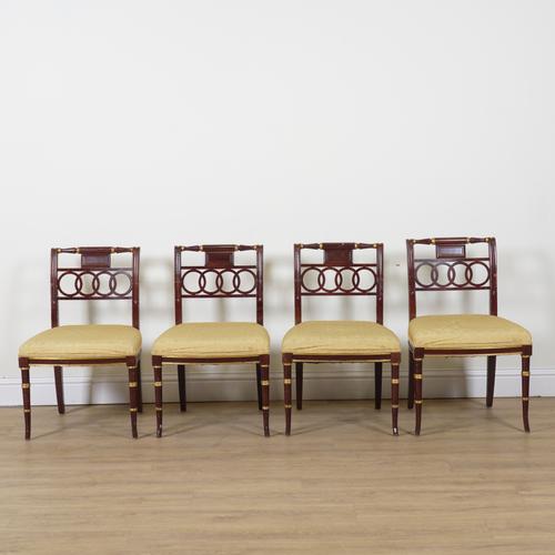 A SET OF FOUR REGENCY STYLE STAINED BEECH PARCEL GILT DECORATED DINING CHAIRS (4)