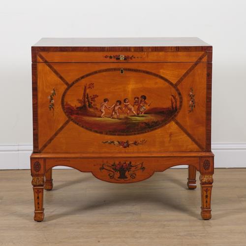 A 19TH CENTURY SATINWOOD AND ROSEWOOD BANDED POLYCHROME DECORATED LIFT TOP TRUNK