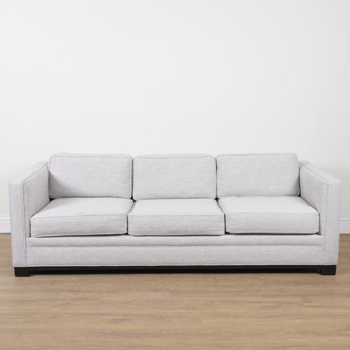 ROBERT LANGFORD, FORD; AN UPHOLSTERED THREE SEAT SOFA