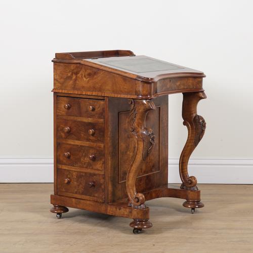 A VICTORIAN WALNUT DAVENPORT