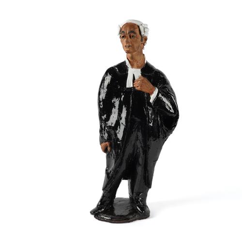 A VERY LARGE CHELSEA POTTERY EARTHENWARE FIGURE OF A BARRISTER/LAWYER