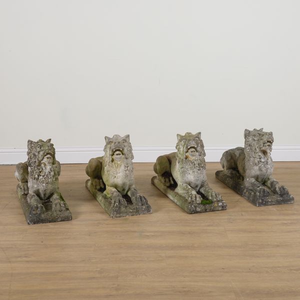 A SET OF FOUR RECONSTITUTED STONE FIGURES OF RECUMBENT BEASTS (4)