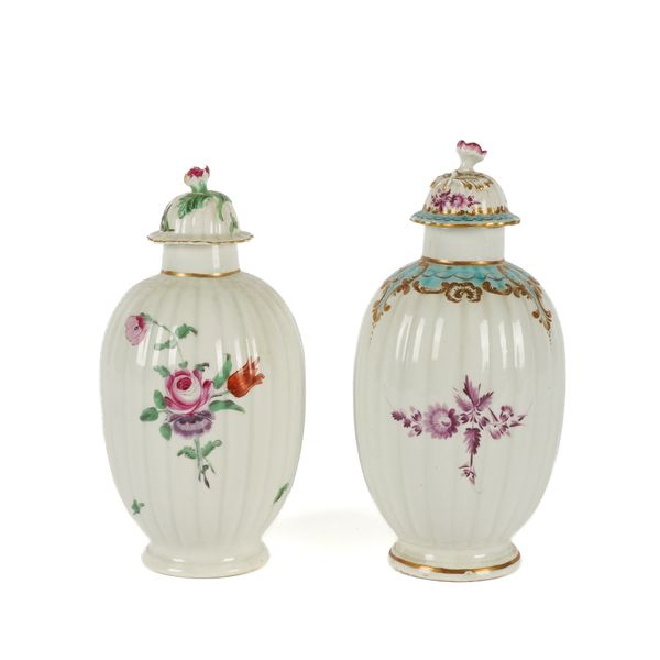 TWO WORCESTER FLUTED TEA CANISTERS AND COVERS (4)