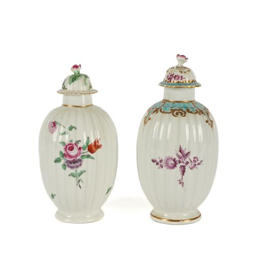 TWO WORCESTER FLUTED TEA CANISTERS AND COVERS (4)