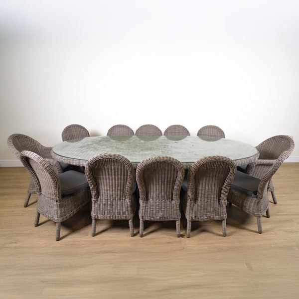 BRIDGMAN; A RATTAN OVAL GARDEN TABLE (13)