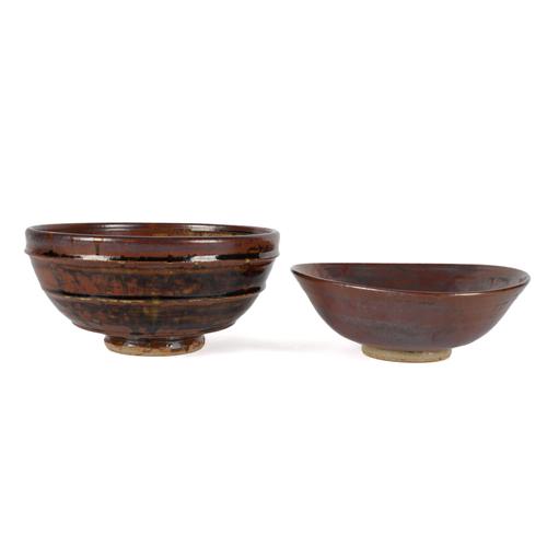 AN URSULA MOMMENS TENMOKU AND ASH GLAZED STUDIO POTTERY STONEWARE BOWL (2)