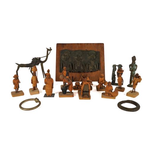 A NIGERIAN RELIEF CAST METAL PLAQUE OF THREE OPOBO CHIEFS TOGETHER WITH TWELVE THORNWOOD FIGURES (19)