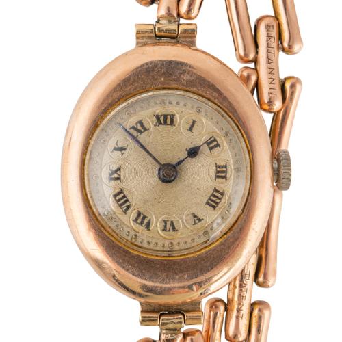 A LADY'S 9CT GOLD OVAL CASED BRACELET WRISTWATCH