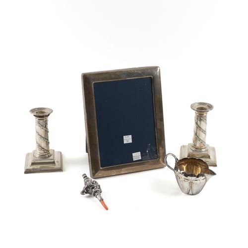 A PAIR OF VICTORIAN SILVER CANDLESTICKS AND THREE FURTHER ITEMS (5)