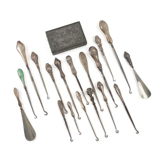 AN ASIAN RECTANGULAR BOX AND A GROUP OF SILVER MOUNTED BUTTON HOOKS AND SHOE HORNS (19)