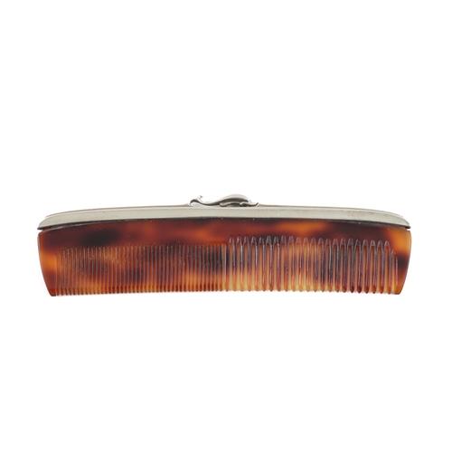 A GEORG JENSEN SILVER MOUNTED IMITATION TORTOISESHELL COMB