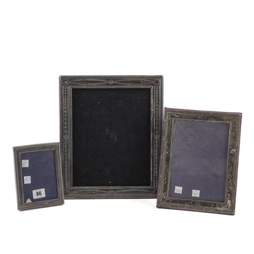 THREE SILVER MOUNTED RECTANGULAR PHOTOGRAPH FRAMES (3)