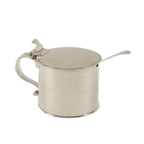 A SILVER MUSTARD POT AND A SILVER SALT SPOON (3)