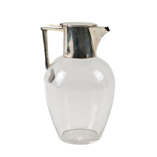 A SILVER MOUNTED GLASS CLARET JUG