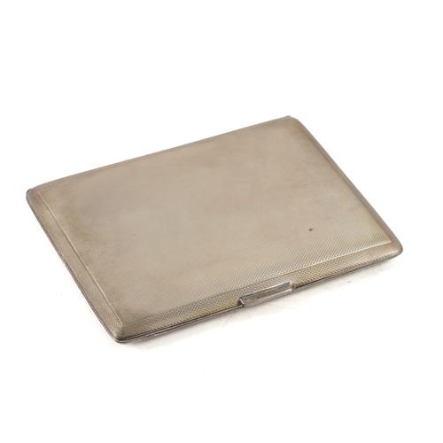 A SILVER RECTANGULAR CIGARETTE CASE