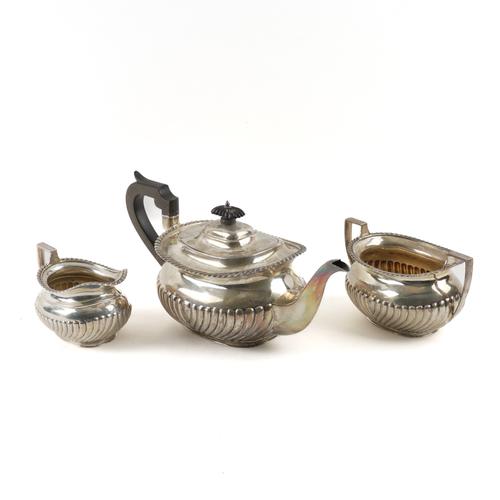 A SILVER THREE PIECE TEA SET (3)