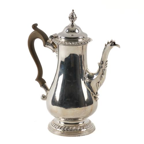A GEORGE III SILVER COFFEE POT