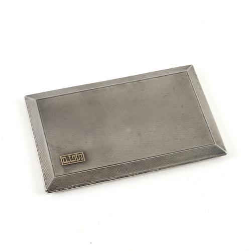 A SILVER RECTANGULAR CIGARETTE CASE