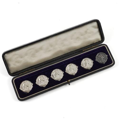 SIX SILVER BUTTONS (6)
