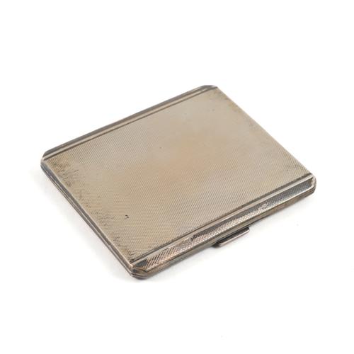 A SILVER RECTANGULAR CIGARETTE CASE