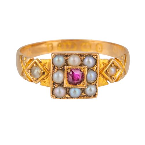 A VICTORIAN 15CT GOLD RUBY AND HALF PEARL SQUARE CLUSTER RING