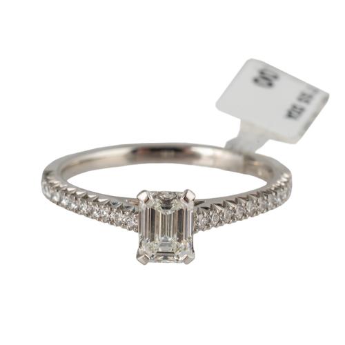 AN EMERALD CUT DIAMOND RING (2)