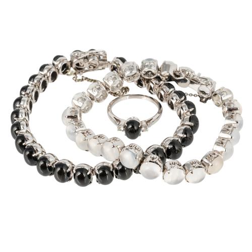 A MOONSTONE BRACELET, A CABOCHON STAR DIOPSIDE BRACELET AND A SIMILAR RING (3)