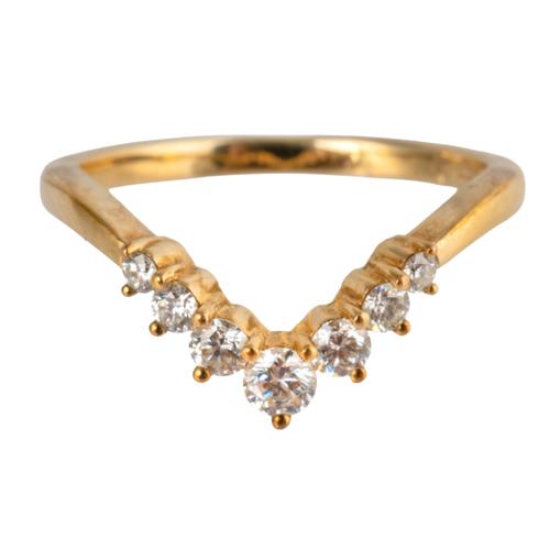 A 9CT GOLD AND DIAMOND SEVEN STONE WISHBONE SHAPED RING
