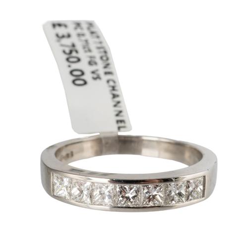 A PRINCESS CUT DIAMOND HALF ETERNITY RING