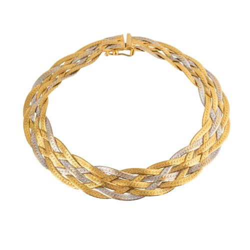 A BICOLOUR GOLD WOVEN BRACELET